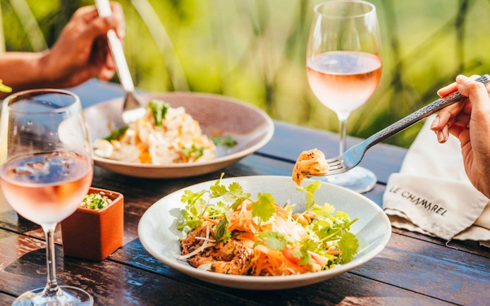 Lunch at Le Chamarel restaurant, Chamarel, Mauritius with salad and wine.
