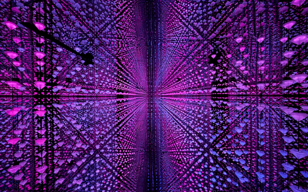 Visitors experiencing digital immersive art at Moco Museum, Barcelona.