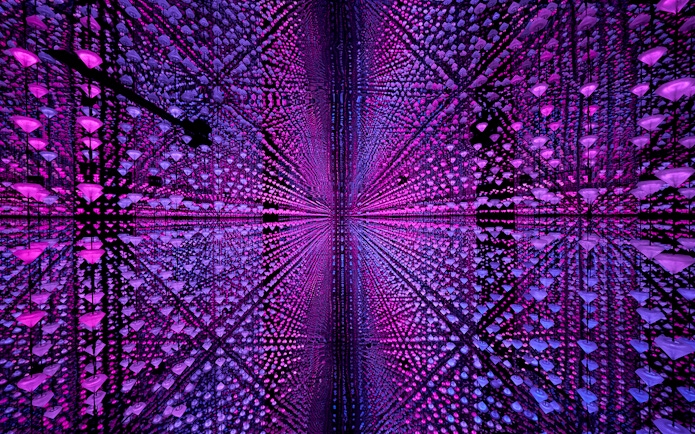 Visitors experiencing digital immersive art at Moco Museum, Barcelona.