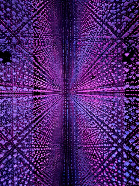 Visitors experiencing digital immersive art at Moco Museum, Barcelona.