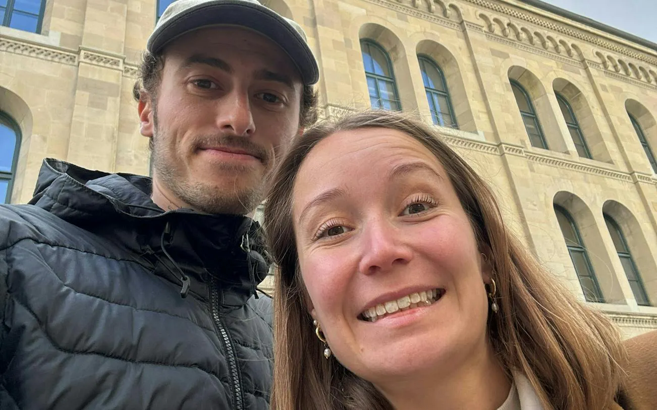 Couple exploring Zurich during a self-guided murder mystery city game.