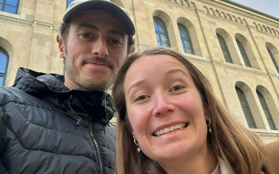 Couple exploring Zurich during a self-guided murder mystery city game.