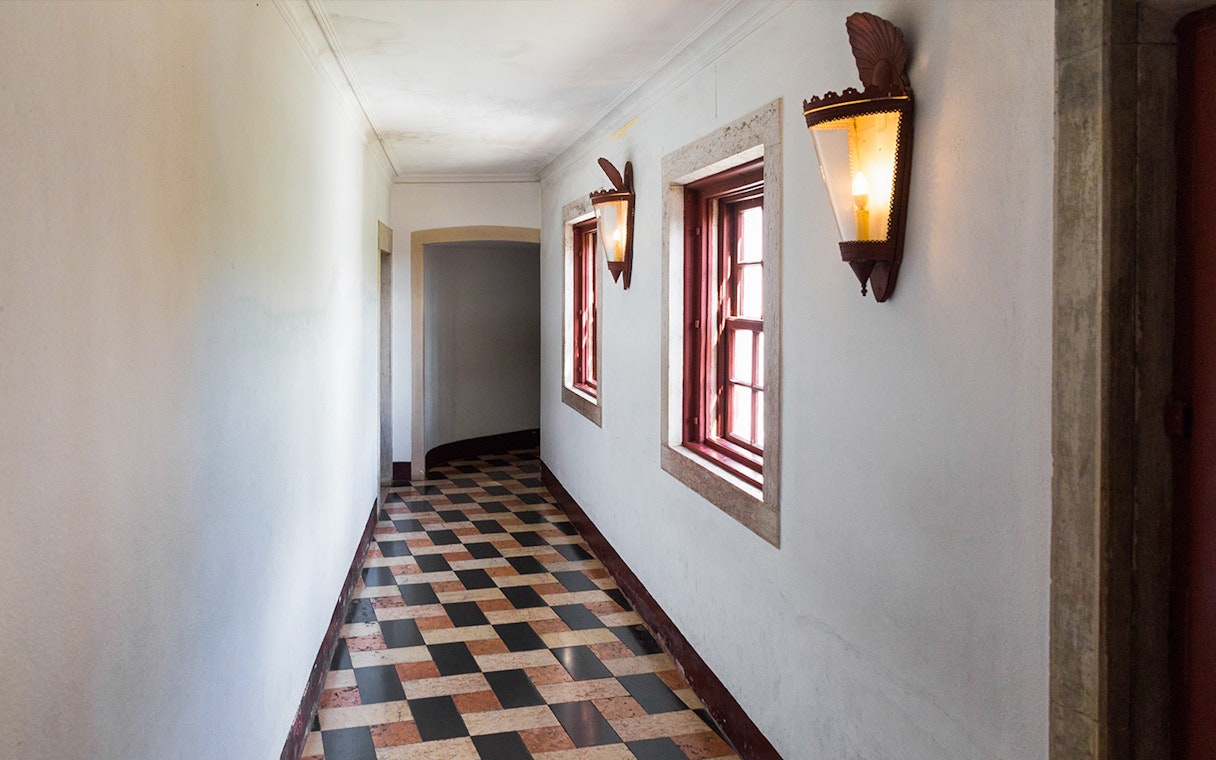 Hallway inside National Sintra Palace with Portuguese ceramic tiles.