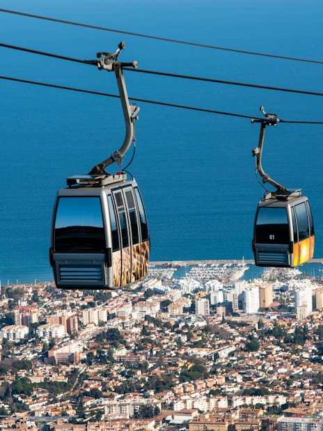 Benalmadena cable car over cityscape and coastline, Malaga, Spain.