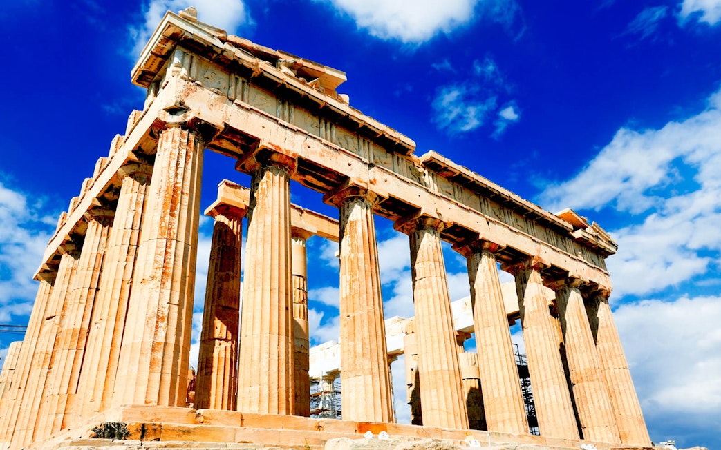 Acropolis Parthenon under blue sky, Athens, Greece.