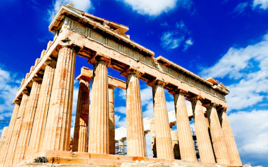 Acropolis Parthenon under blue sky, Athens, Greece.