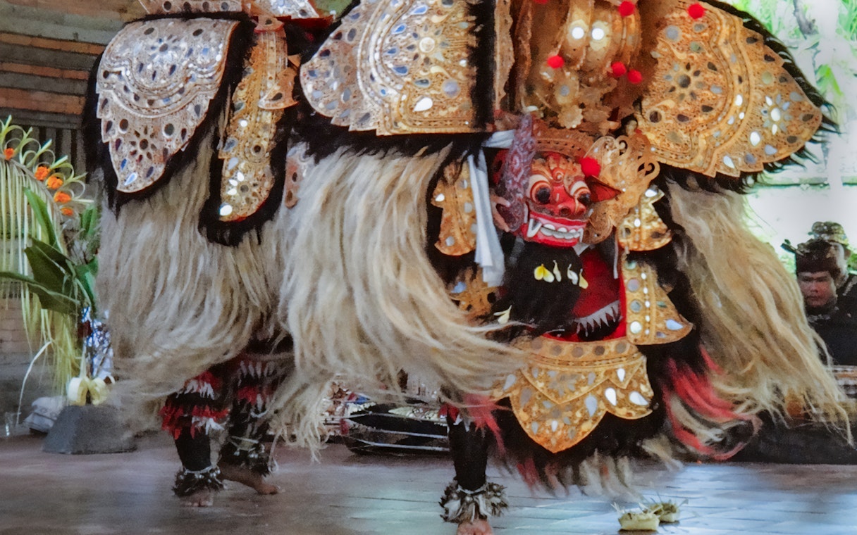 Barong Dance performance at Arma Museum Resort, featuring traditional costumes and masks.