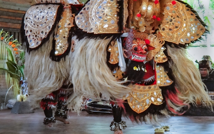 Barong Dance performance at Arma Museum Resort, featuring traditional costumes and masks.