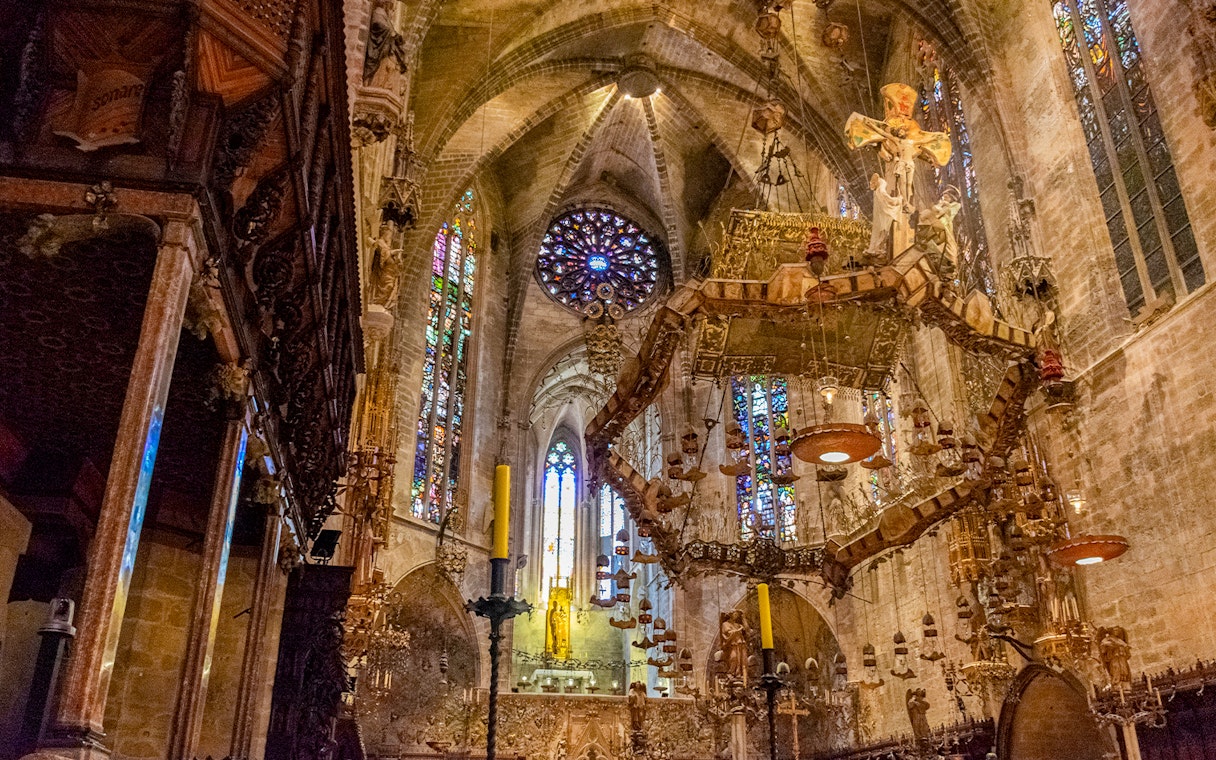 Altarpiece and stained glass windows inside Palma Cathedral, Mallorca.