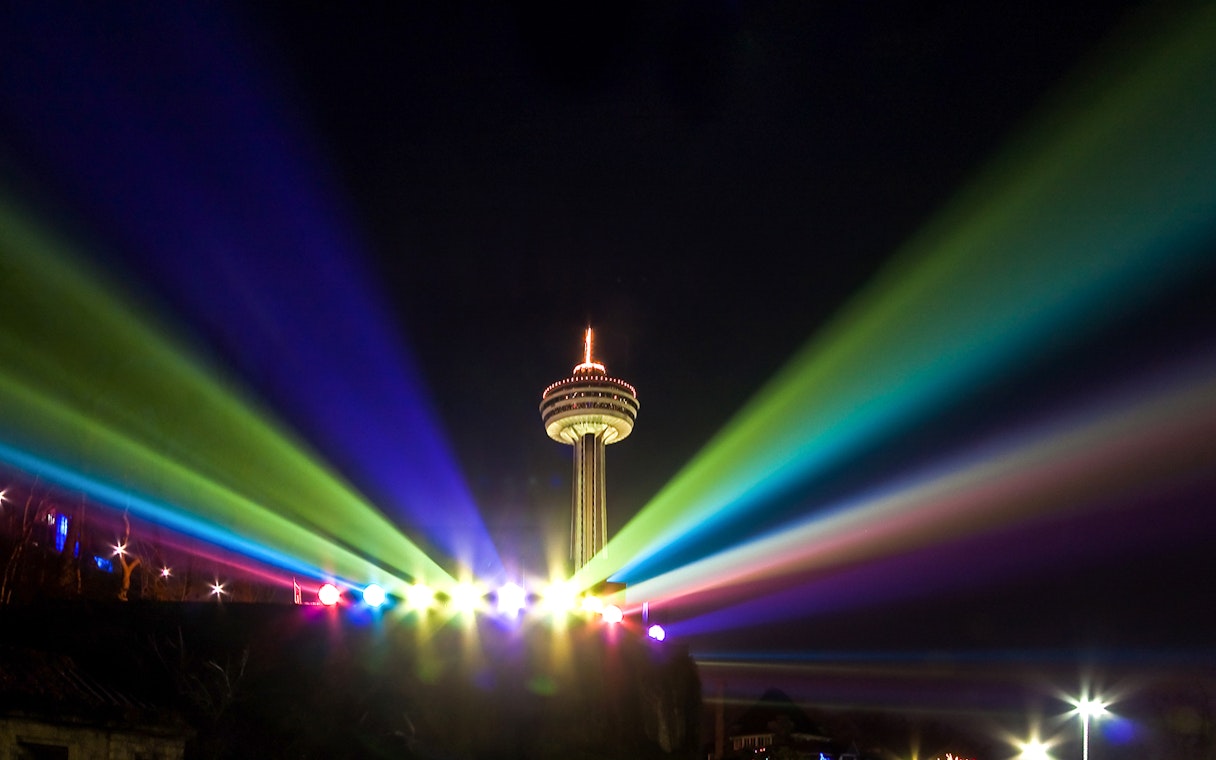 Skylon Tower illuminated by colorful lights during the Festival of Lights, Niagara Falls, Ontario.