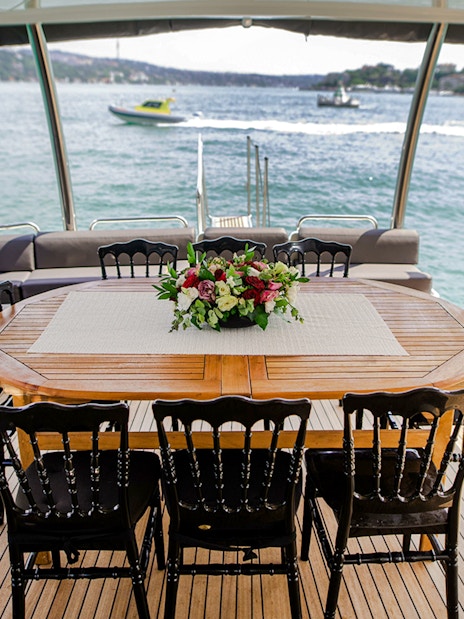 Dining setup on a luxury yacht cruise along the Bosphorus.