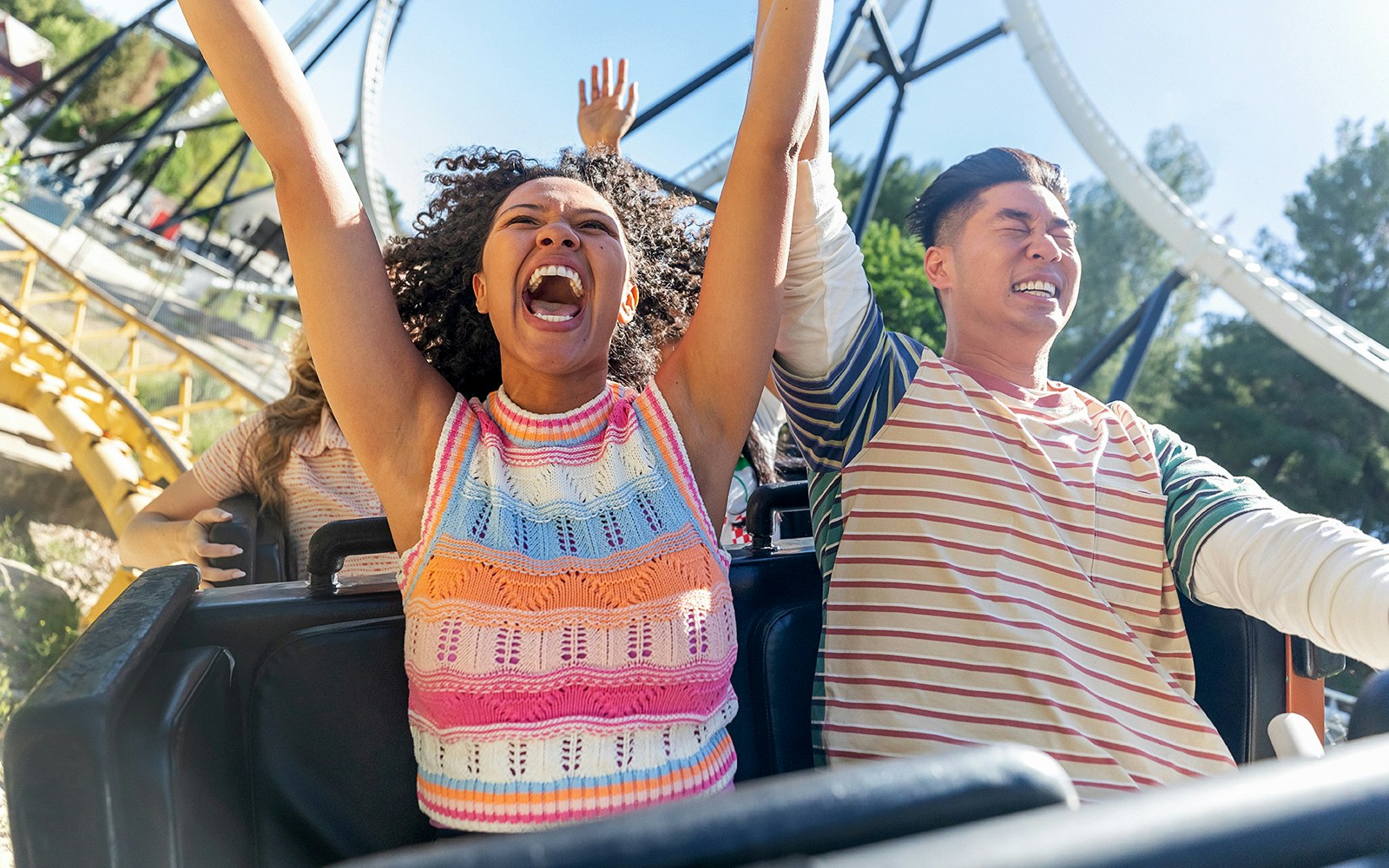 People enjoying a roller coaster ride at Six Flags Magic Mountain.
