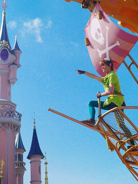 Peter Pan and pirate on a ship near Sleeping Beauty Castle at Disneyland Paris.
