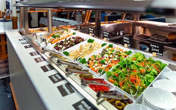 Buffet with salads and vegetables on Milford Sound overnight cruise.