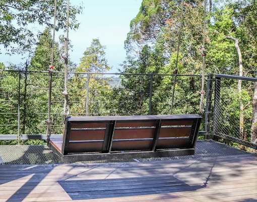 Giant swings overlooking lush greenery at Habitat Penang Hill, Malaysia