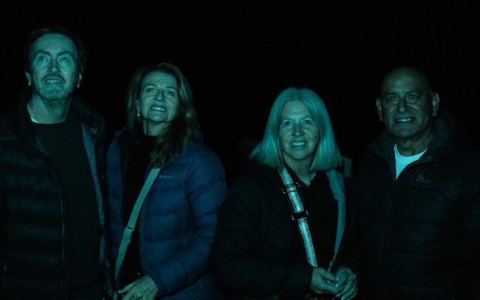 Group enjoying Evening Rainforest & Glow Worm Experience tour.