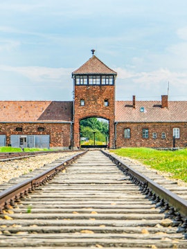 Railway tracks leading to the entrance of Auschwitz Birkenau, Poland.
