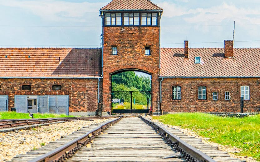 Railway tracks leading to the entrance of Auschwitz Birkenau, Poland.