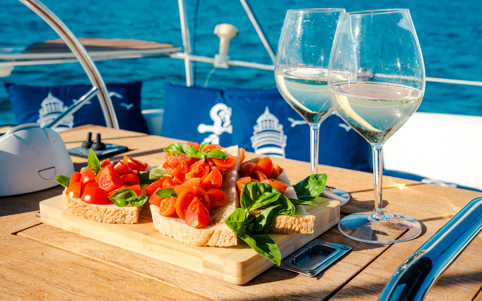 Capo Comino Small-Group Sailing Cruise with Lunch and Snorkeling