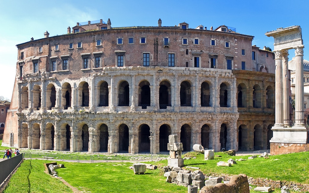 Theatre of Marcellus in Rome with ancient arches and columns.