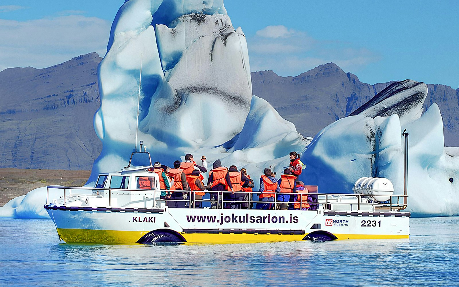 Tourists enjoying the boat ride during Glacier Lagoon (Jökulsárlón) & South Coast Tour