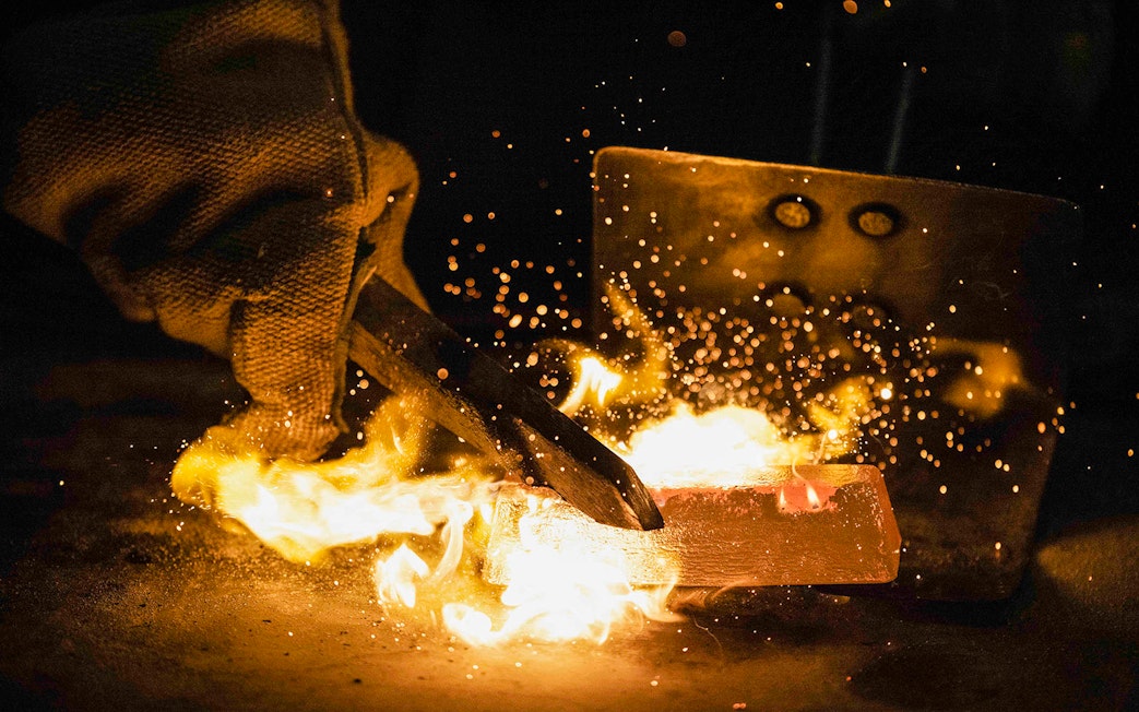 Molten gold being poured at Sovereign Hill Museum gold mine.