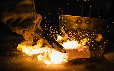 Molten gold being poured at Sovereign Hill Museum gold mine.