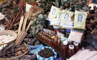 Traditional herbal market stall with natural remedies and herbs in Durban, South Africa.