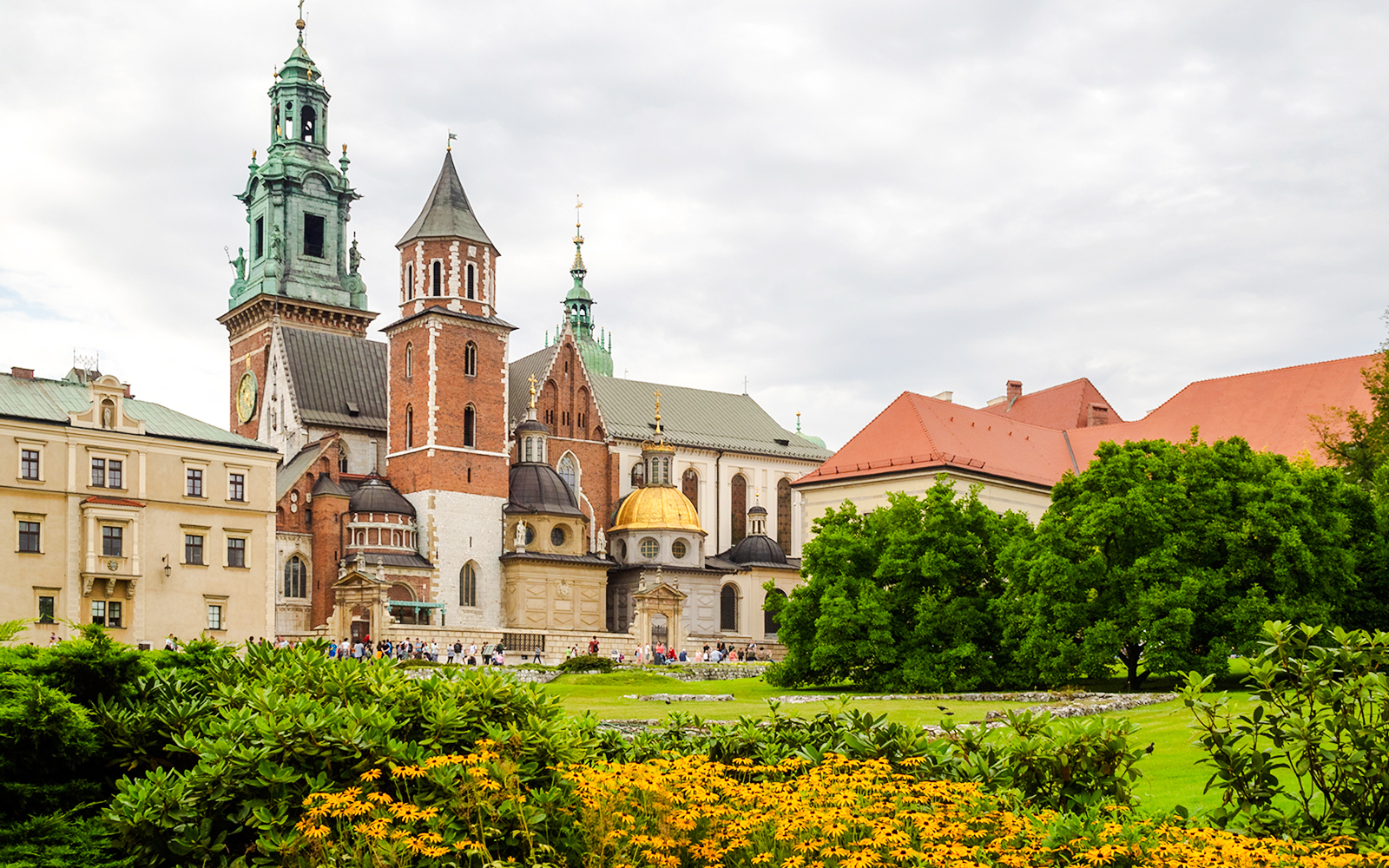 Wawel Castle and Cathedral in Krakow with gardens in the foreground.