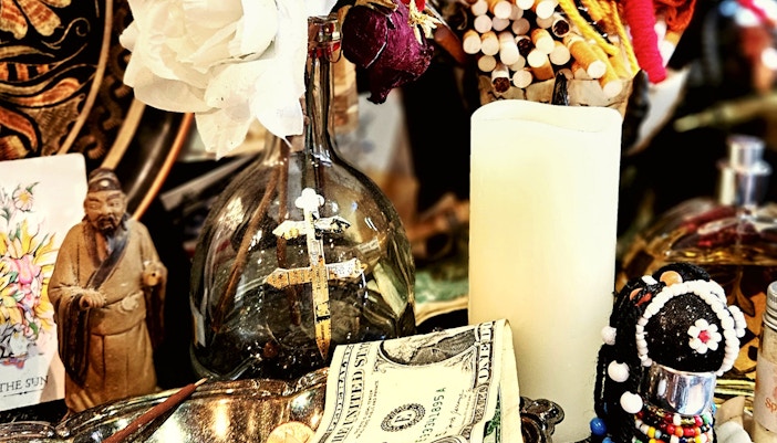 Voodoo artefacts displayed in a New Orleans shop during a haunted ghost, voodoo, and vampire tour.