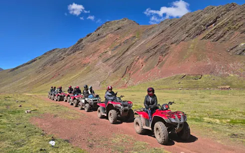 ATV riders on a trail near Rainbow Mountain, Cusco.