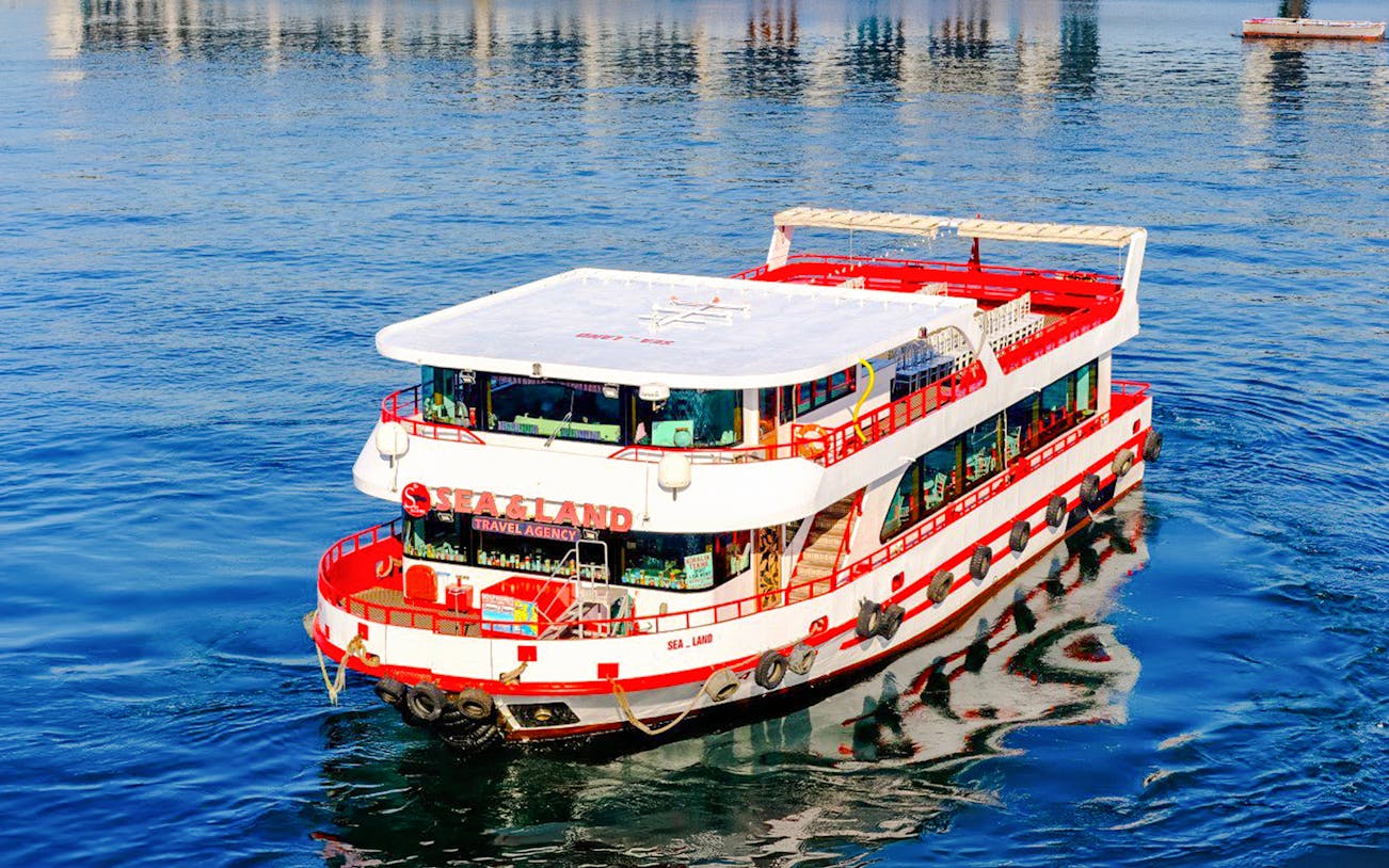 Bosphorus cruise ship on blue water in Istanbul.