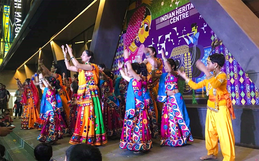 Dancers in traditional attire perform at Indian Heritage Centre, Singapore.