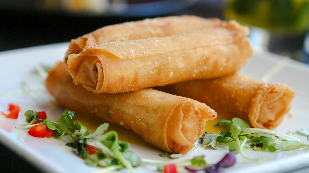 Spring rolls on a table.