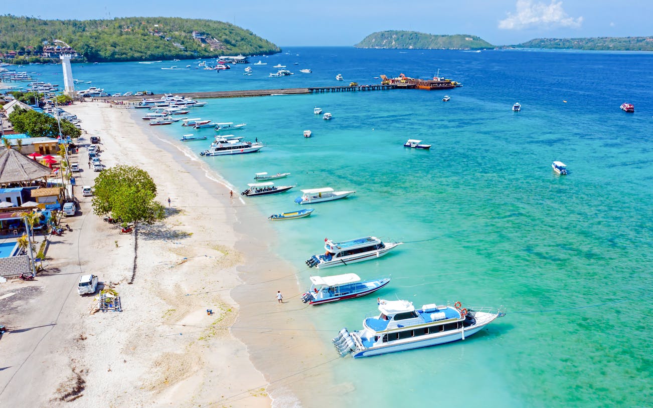Aerial view of boats at Toya Pakeh Harbour, Nusa Penida, Bali, Indonesia.