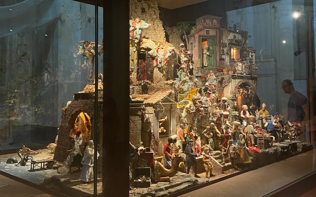 Nativity scene display in the Catacombs of San Gaudioso, Naples, featuring detailed figurines.