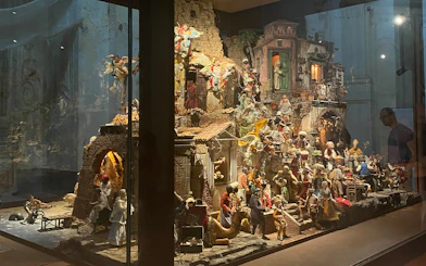 Nativity scene display in the Catacombs of San Gaudioso, Naples, featuring detailed figurines.