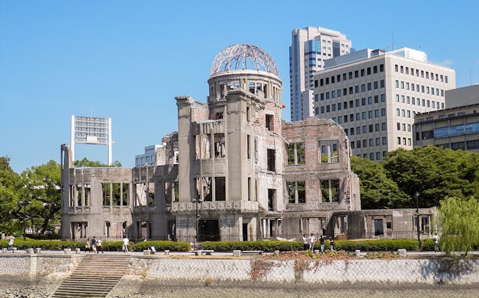 Hiroshima Peace Memorial with surrounding cityscape on sightseeing bus tour.