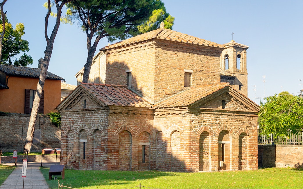 Galla Placidia Mausoleum in Ravenna, showcasing intricate brickwork and historic architecture.