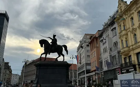Equestrian statue in Zagreb's main square during a self-guided city exploration game.