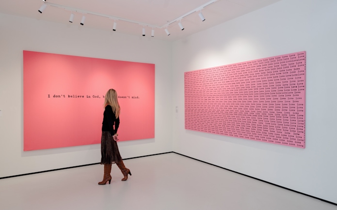 Guest viewing contemporary art at Moco Museum London exhibit.