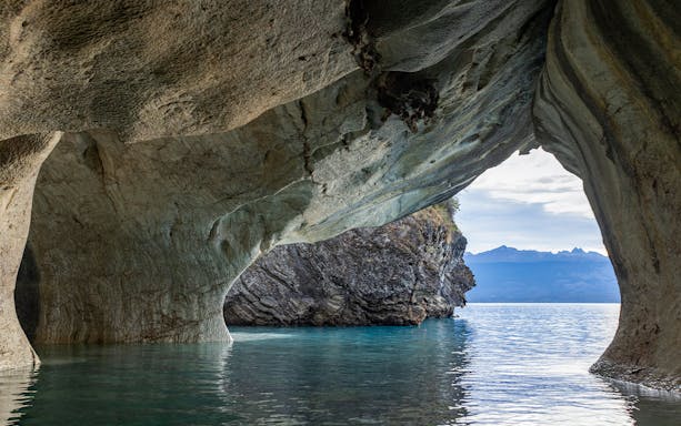 Kayak view of coastal cave along Sorrento Coast near Crapolla Fjord, Italy.