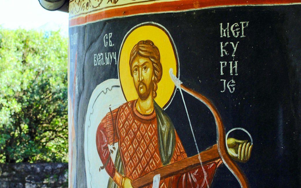 Fresco of a saint with a bow at Kom Monastery, Lake Skadar.