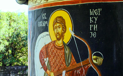 Fresco of a saint with a bow at Kom Monastery, Lake Skadar.