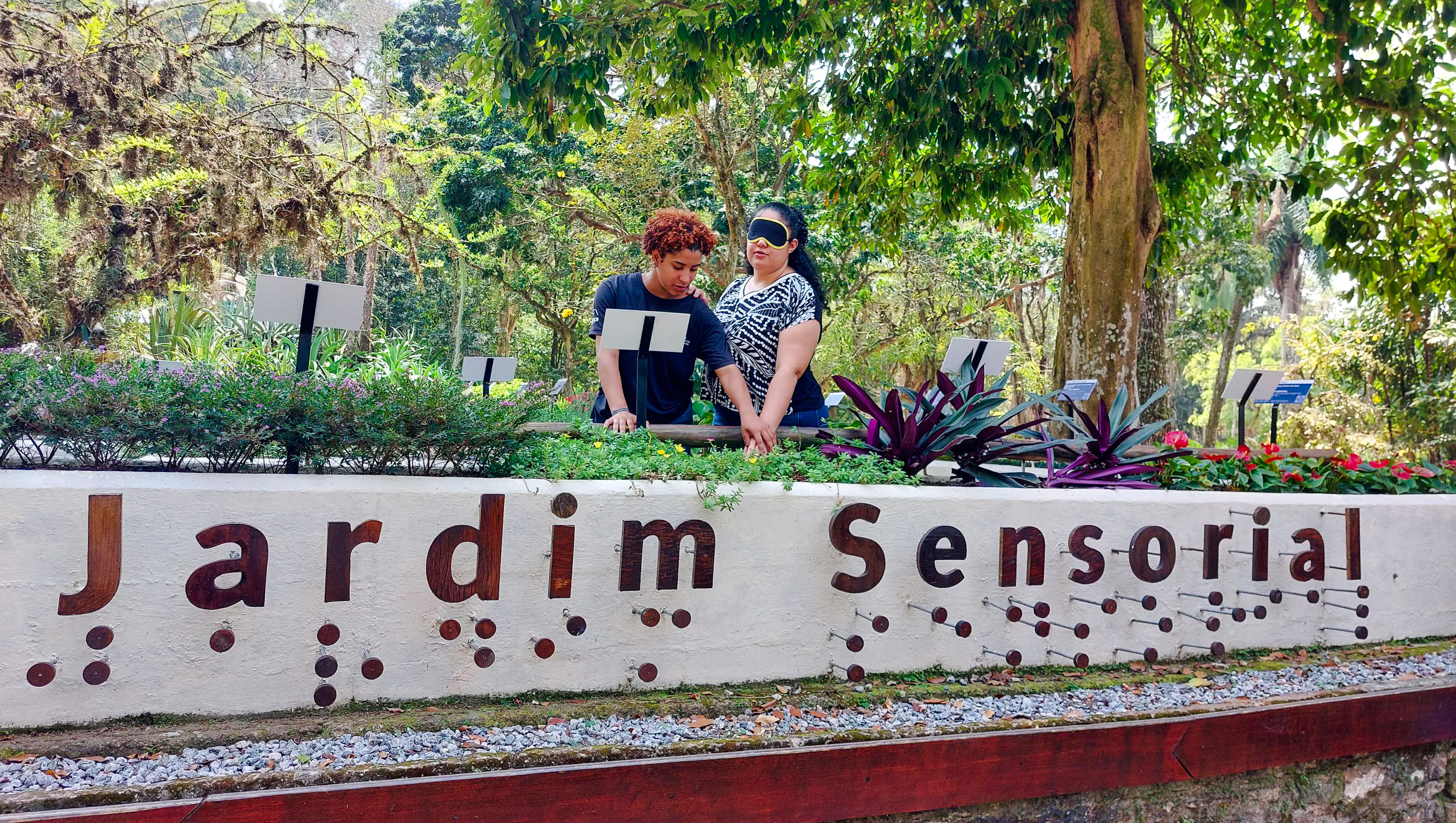 Visitors exploring sensory garden at Botanical Garden, Rio de Janeiro.