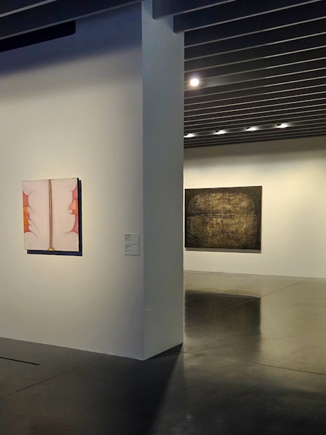 Centre Pompidou Malaga exhibition interior with abstract paintings on display.
