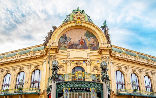 Municipal House Prague exterior with ornate facade and mosaic.
