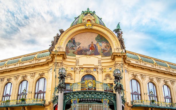 Municipal House Prague exterior with ornate facade and mosaic.