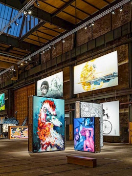 Straat Museum Amsterdam interior with vibrant street art displays.