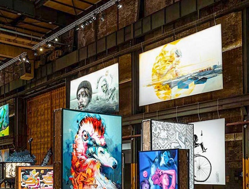 Straat Museum Amsterdam interior with vibrant street art displays.